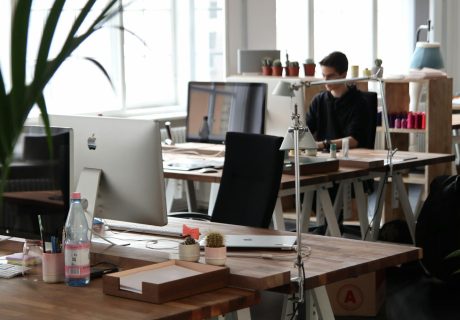 man sitting in front of computer